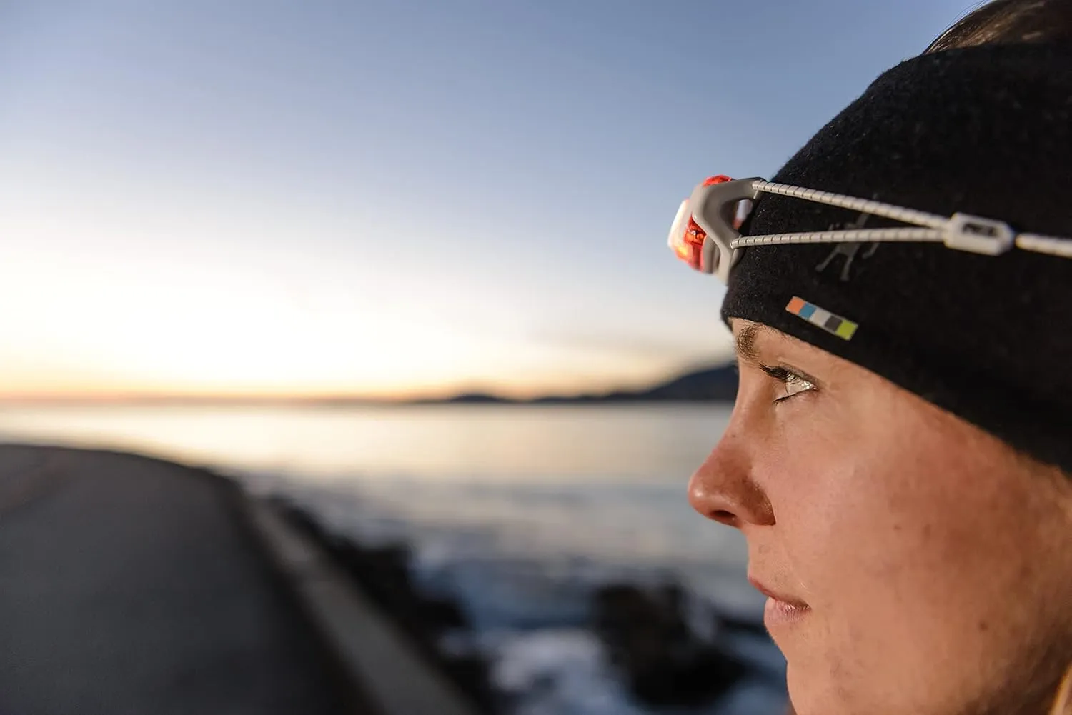 PETZL Bindi Headlamp - Ultra-Compact Rechargeable 200 Lumen Headlamp Designed for Everyday Athletic Activities - Orange